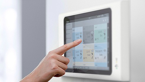 Centralized Controllers for Commercial AC_0